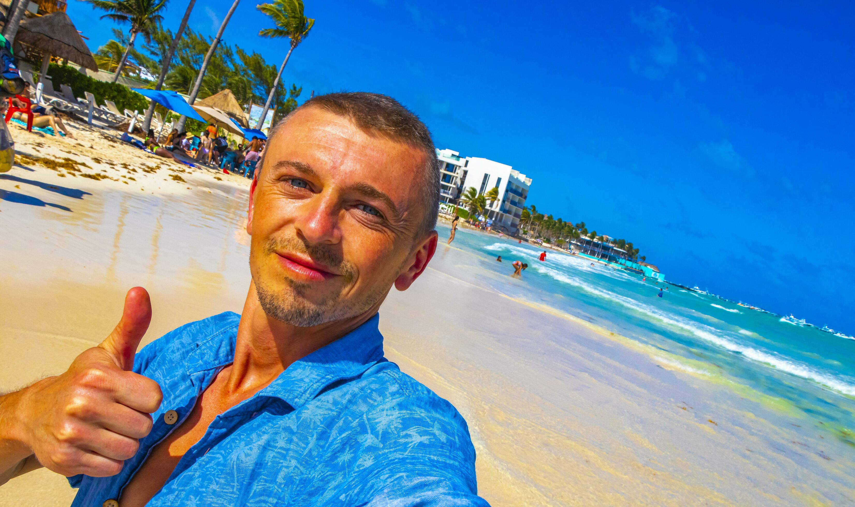 files/male-tourist-travelling-man-taking-selfie-playa-del-carmen-mexico-free-photo.jpg